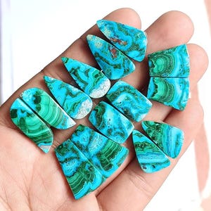 Semi precious chrysocolla malachite cab lot close up texture