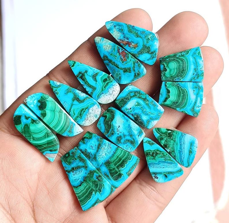 Semi precious chrysocolla malachite cab lot close up texture