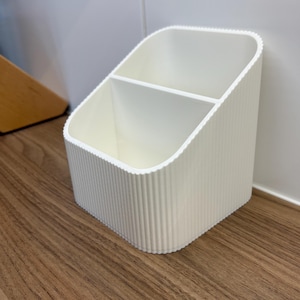 Houder voor afstandsbediening – moderne opberger voor in de woonkamer