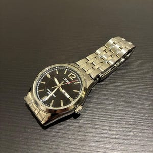Silver Men’s Casio MTP-1335 Silver Quartz Watch Japanese Retro Silver Day Date