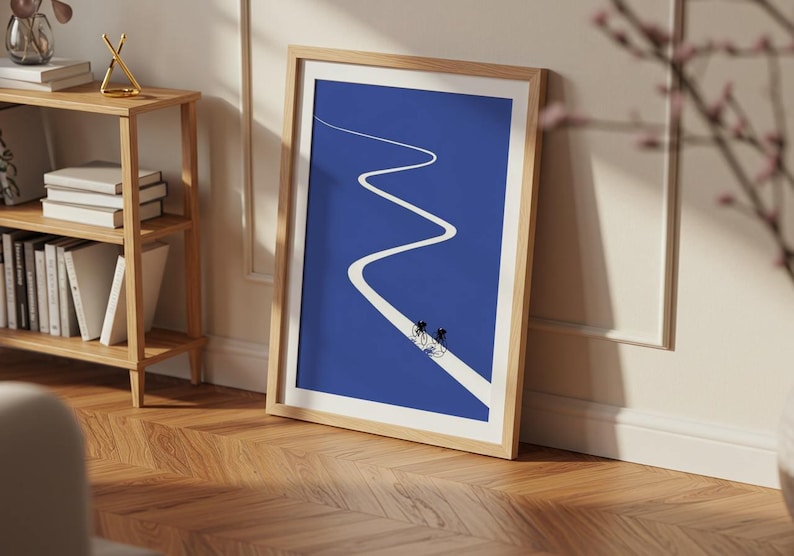 Minimalist illustration of two cyclists on a white winding road over a solid blue background, emphasizing movement and endurance.