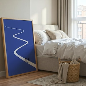 Minimalist illustration of two cyclists on a white winding road over a solid blue background, emphasizing movement and endurance.