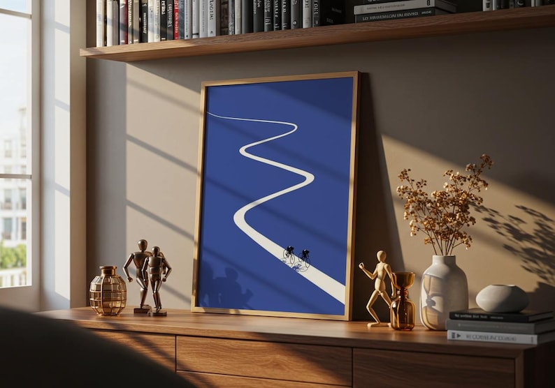 Minimalist illustration of two cyclists on a white winding road over a solid blue background, emphasizing movement and endurance.