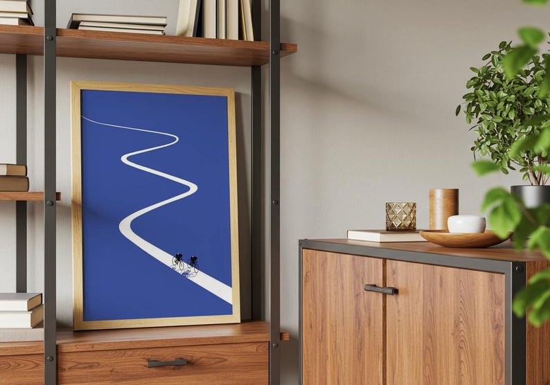 Minimalist illustration of two cyclists on a white winding road over a solid blue background, emphasizing movement and endurance.