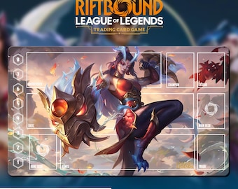 May include: A League of Legends trading card game playmat featuring a character illustration with a dragon-like mask. The mat has card zones and the text "RIFTBOUND LEAGUE OF LEGENDS TRADING CARD GAME" and "WITH CARD ZONES OR NO ZONES".