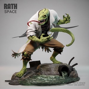 May include: A detailed statue of a lizard-like creature with green skin, wearing a white lab coat and torn brown pants. The figure has a long tail and is posed on a rocky base with a sewer pipe. The text "RATH SPACE" is visible.
