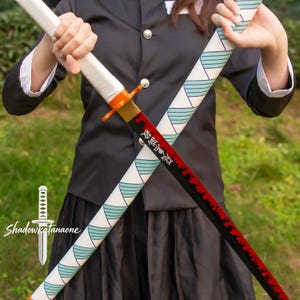 thumbnail interactive-video image 1 of Kyojuro Rengoku Demon Slayer Katana – Carbon Steel Blade, Wood Handle, Orange, Cosplay Sword 1 of 5