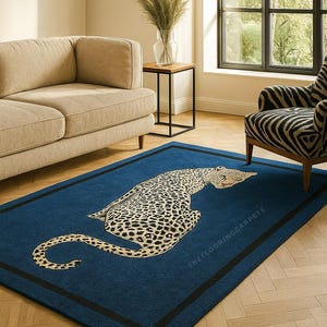 Leopard on Navy Blue Area Rug: Striking animal print design adds wild elegance and modern sophistication to any room.