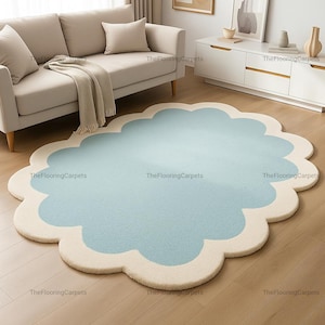 Blue and Cream Cloud Area Rug - A soft, plush, and unique scalloped rug perfect for adding a touch of whimsy and comfort to any room.