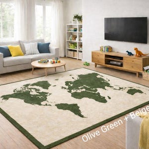 May include: A large rectangular rug with a world map design in olive green and beige. The rug has a dark green border and is placed in a living room setting with a sofa, coffee table, and entertainment center.
