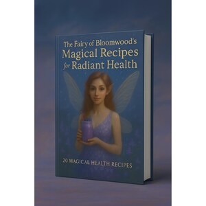 May include: A hardcover book titled "The Fairy of Bloomwood's Magical Recipes for Radiant Health." The cover features a fairy holding a purple drink, with text indicating 20 magical health recipes. The book has a blue cover and spine.