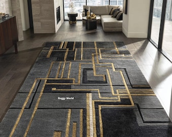 Tappeto nero e oro, lussuoso tappeto geometrico, moderno tappeto trapuntato in stile Art Déco, elegante complemento d'arredo per il soggiorno.