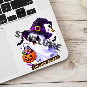 May include: A die-cut sticker featuring a white ghost wearing a purple witch hat with a gold buckle and a crescent moon charm. The ghost holds an orange jack-o'-lantern bucket filled with colorful candies. The text SPOOKY SWEET is printed below.