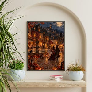 May include: A framed wall art print depicting a nighttime autumn village scene with a central stone fountain, glowing lanterns, fallen orange leaves, and two figures walking on a cobblestone path under a full moon and a starry night sky.
