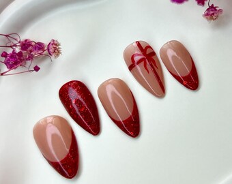 Handgemachte Press On Nails mit rotem Glitzer French und Bow Art, Weihnachtsnagel-Set für festliche Looks