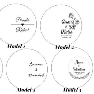 May include: Six circular white labels labelled Model 1 through Model 6, each featuring black text and graphic designs. The designs include names like Pamela and Robert, Isaac and Karina, Anna and Sebastian, Laura and Daniel, and Anna and Alex, accompanied by floral, heart, and leaf motifs.