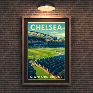 May include: A framed art print featuring a stylized illustration of Stamford Bridge, the home stadium of Chelsea Football Club. The artwork showcases the stadium's architecture in blue, green, and yellow tones, with the word "CHELSEA" at the top.