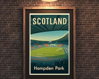 May include: A framed poster featuring a stylized illustration of Hampden Park stadium in Scotland. The poster has a vintage travel aesthetic, with the word "SCOTLAND" at the top and "Hampden Park" at the bottom. The stadium is depicted with a green field and blue sky.
