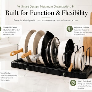 May include: A black expandable cookware organizer with adjustable metal dividers holding various pans and lids. Text reads: Smart Design. Maximum Organization. Built for Function & Flexibility. Expandable Design adjusts from 11.8" to 22.4".