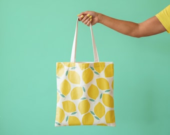 Tote Bag Mockup: Hand Holding 15x16" Cotton Canvas Tote with Sublimation DTF Print and Square Corners, Editable Background Color (PSD File)