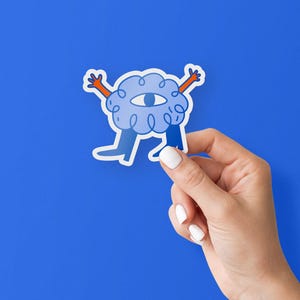 Cricut Sticker Mockup with Editable Background Color: Simple hand holding vinyl sticker. PSD Download.