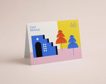 A6 Folded Card Mockup: Standing Horizontal Card on Customizable Color Background, Landscape 5x7 Greeting Card PSD Template