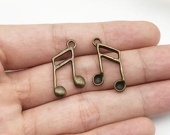 30 piezas de abalorios de guitarra de instrumento musical de tono bronce a granel para pulseras, pendientes, collares, accesorios para hacer joyas, 15 x 20 mm
