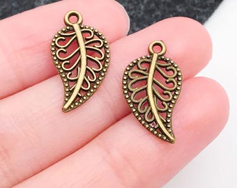 50 pcs 9 x 17 mm Pendentif mini-feuille en bronze antique c3985
