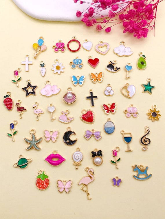 Does anyone know where I can buy charms/pendants like these In bulk,  inexpensive? Thanks : r/jewelrymaking