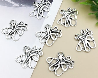 May include: Seven silver-toned octopus charms with intricate details. The charms are perfect for jewelry making, scrapbooking, and other craft projects.