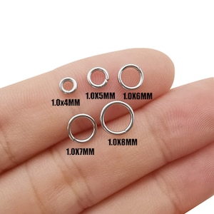 May include: Assortment of silver jump rings in various sizes, ranging from 1.0x4mm to 1.0x8mm.