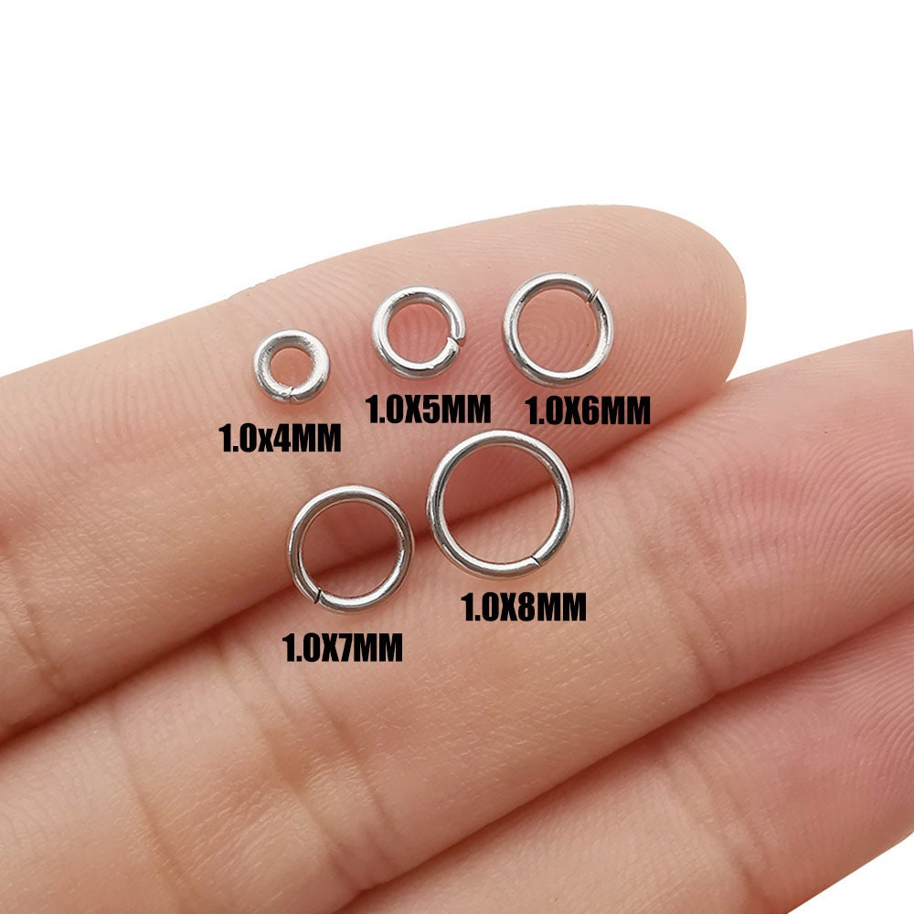 PandaHall Lot de 60 anneaux de liaison en acier inoxydable avec cadre en forme de cœur creux - 3 tailles - Doré et argenté - Pour fabrication de bijoux