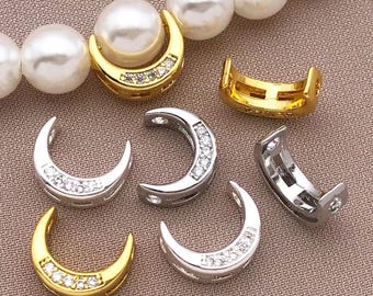 Puede incluir: Seis cierres de joyería en forma de media luna con diamantes de imitación transparentes. Tres son plateados y tres son dorados.