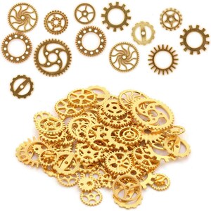 May include: A large pile of gold-colored metal gears of various sizes and shapes. The gears are arranged in a random pattern, with some overlapping. The gears are all made of the same metal and have a shiny finish.