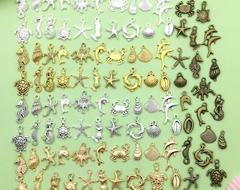Mix 20/100 Stück antikes Silber Ocean Serie Handwerk Charms Seestern Oktopus Schildkröte Anhänger für DIY Armbänder Ohrringe Halsketten Zubehör