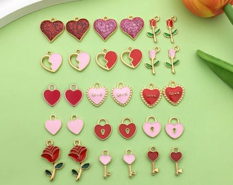 May include: Assortment of gold-tone metal charms featuring hearts, roses, and keys. The charms are decorated with red, pink, and white enamel. Some charms have glitter, while others have the word "love" written on them.
