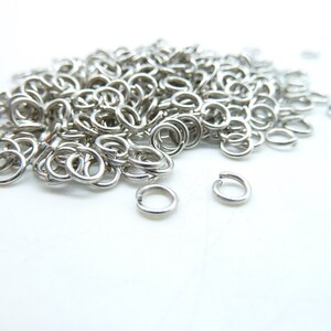 About 750pcs 4mm White K Silver Tone Jump Ring ---30g