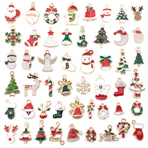 May include: Assortment of gold-tone Christmas charm pendants featuring various holiday themes, including snowmen, reindeer, candy canes, Christmas trees, Santa Claus, and ornaments.