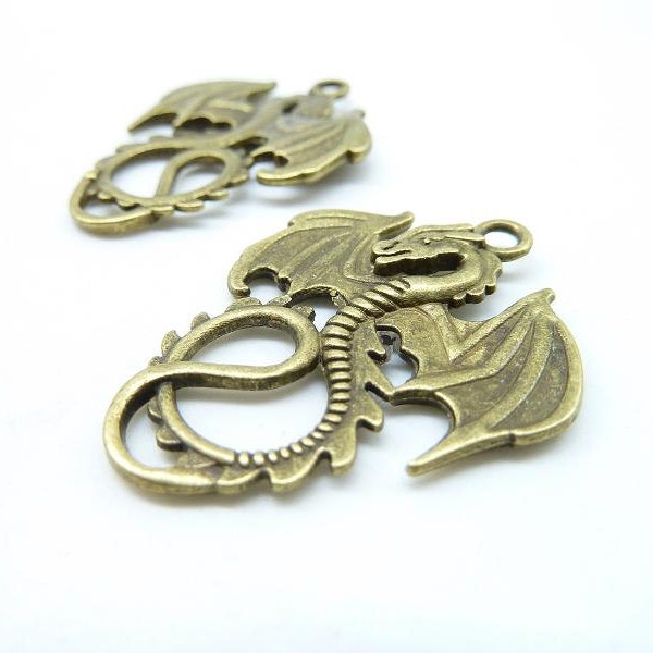 New 10pcs 28x35mm Antique Bronze Flying Dragon Charms Pendant C6997