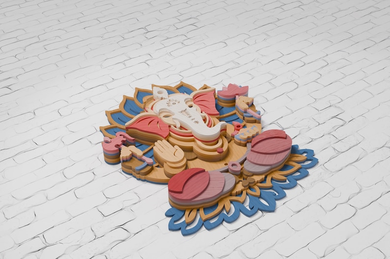 May include: A multi-layered wooden wall art piece depicting the deity Ganesha. The design features stacked laser-cut wood elements in shades of white, pink, tan, and blue, forming a detailed representation of Ganesha seated on a lotus flower base.