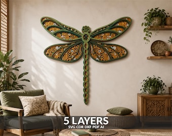 May include: A multi-layered wooden dragonfly wall art piece featuring intricate cut-out scrollwork patterns in shades of forest green, mustard yellow, and white. The design consists of five distinct layers, creating a dimensional effect.