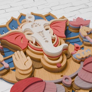 May include: A multi-layered wooden wall art piece depicting the deity Ganesha. The design features stacked laser-cut wood elements in shades of natural light wood, soft pink, deep red, and blue, creating a three-dimensional relief effect.