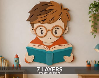May include: A multi-layered wooden wall art piece depicting a cartoon character with brown hair and round glasses reading an open teal book. The design features seven distinct layers of wood, showcasing a person wearing an orange shirt.