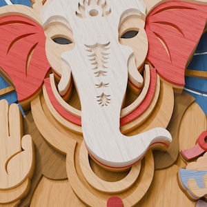 May include: A multi-layered wooden wall art piece depicting the deity Ganesha. The design features stacked laser-cut wood panels in natural light wood, red, and blue tones, showcasing Ganesha with an elephant head, trunk, and raised hand gesture.