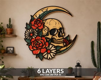 May include: A multi-layered wall art piece featuring a beige skull nestled within a crescent moon, adorned with red and white flowers and green leaves. The design includes black outlines and text at the bottom reading 6 LAYERS SVG CDR DXF PDF AI.