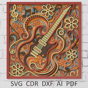 Puede incluir: Una obra de arte de madera en capas que presenta una guitarra, notas musicales y diseños florales en tonos marrones, naranjas y amarillos. La obra está enmarcada en un borde rojo e incluye el texto "SVG CDR DXF AI PDF" en la parte inferior.