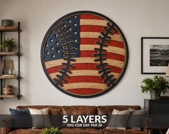 May include: A circular wooden wall art piece featuring a layered design of a baseball with red, white, and blue American flag patterns. The artwork includes black stitching details and the text 5 LAYERS SVG CDR DXF PDF AI at the bottom.
