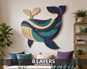 May include: A multi-layered wooden wall art piece shaped like a whale, featuring eight distinct layers in shades of natural wood, teal, dark blue, and purple. The design includes a spout, a curved body, and a tail, with the text 8 LAYERS SVG CDR DXF PDF AI.