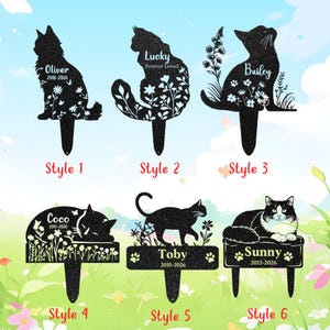 May include: Six black metal garden stakes featuring cat silhouettes with personalised names and dates. Style 1: Oliver, Style 2: Lucky Forever Loved, Style 3: Bailey, Style 4: Coco, Style 5: Toby, and Style 6: Sunny, each with floral or paw print accents.