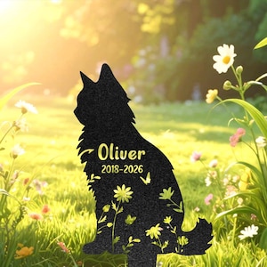 May include: A black cat-shaped silhouette garden stake featuring the name Oliver and the years 2018-2026 printed in yellow. The surface of the cat silhouette is decorated with yellow floral patterns and small butterfly graphics throughout the design.